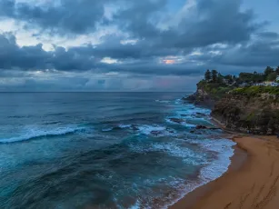 Sunrise Seascape with Rain Clouds