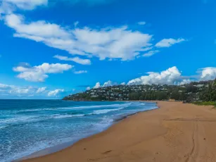 Morning views at the seaside with clouds and a blue sky