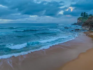 Sunrise Seascape with Rain Clouds
