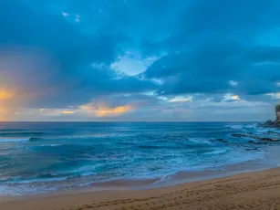 Sunrise Seascape with Rain Clouds