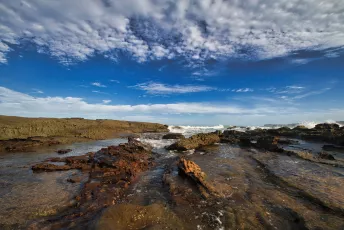 standing on a rock watching the skies